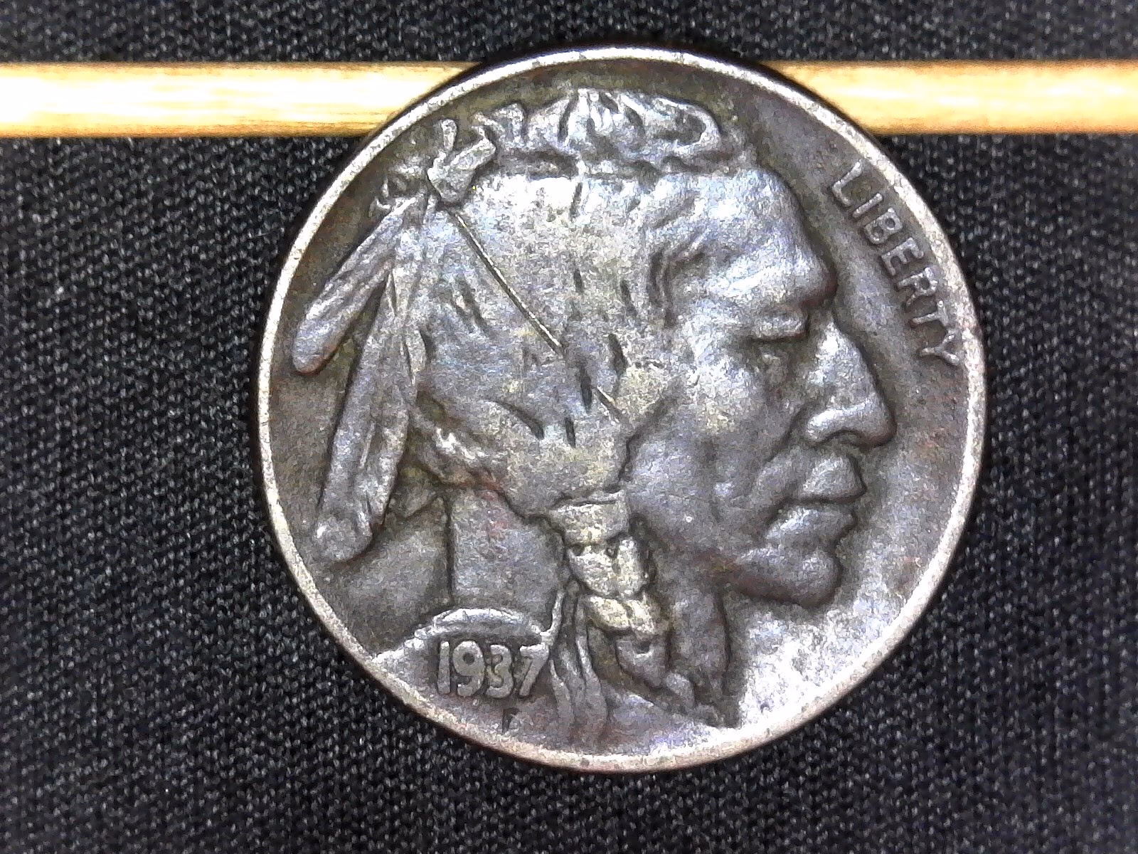 Should you remove patina from coins?